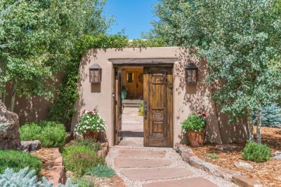 Doors open to entry courtyard