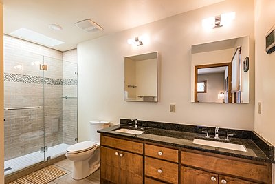 Remodeled Master Bathroom with granite countertops