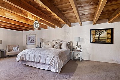 Lower Level Bedroom with Beamed Ceiling