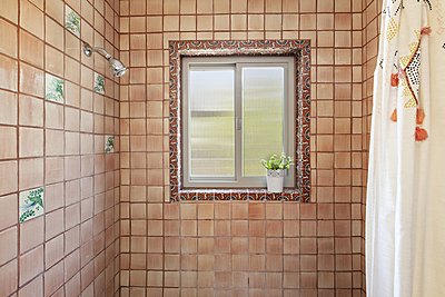 Charming tile work in Guest Bathroom