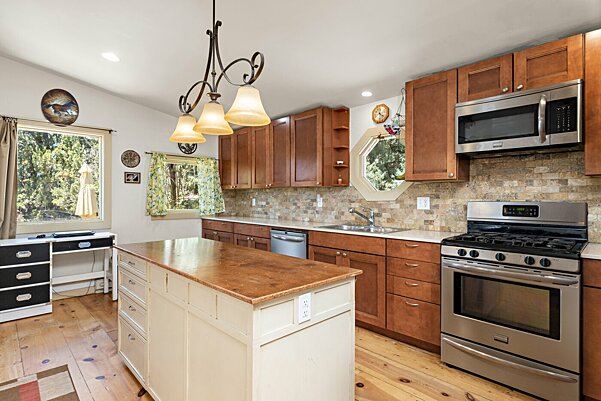 Gracious Kitchen with Tons of Countertops and Cabinetry