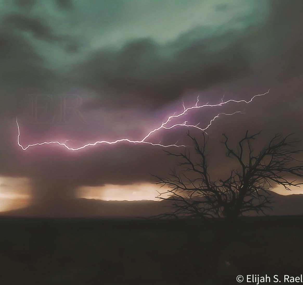 PHOTO: Touching the Skies by Elijah Rael